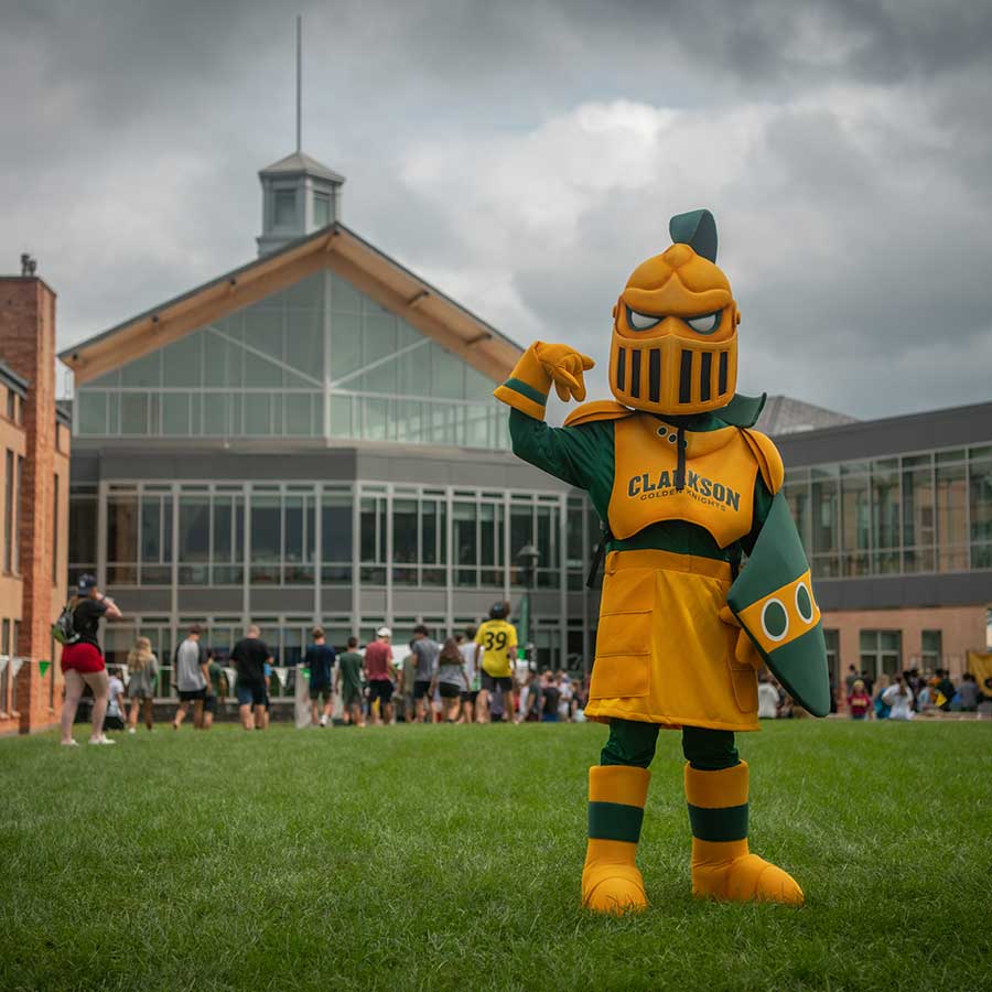 Golden Knight in front of the student Center Welcoming Visitors