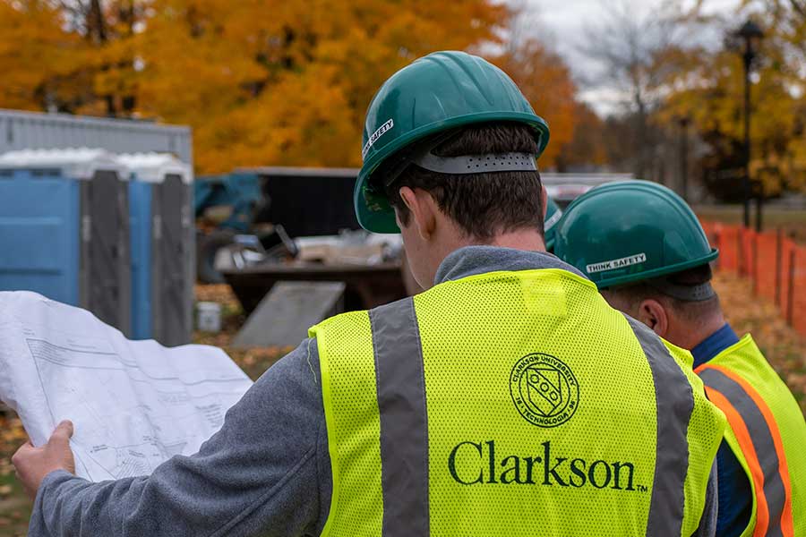 Students working with construction documents