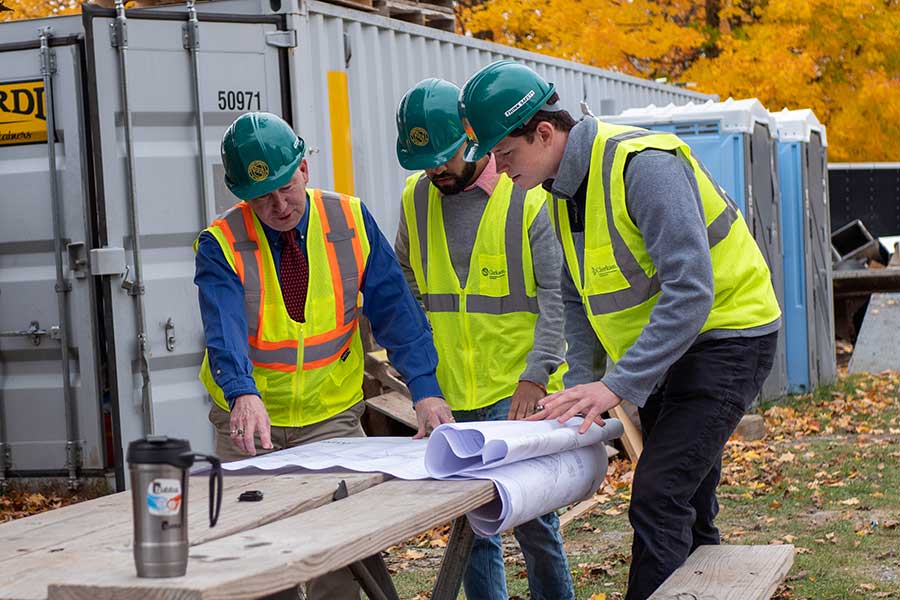 Students working with construction plans