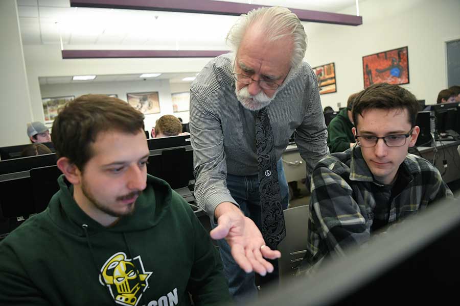 Students and a professor in a computer lab