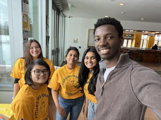 A photo of math club students enjoying the Pi Day event.