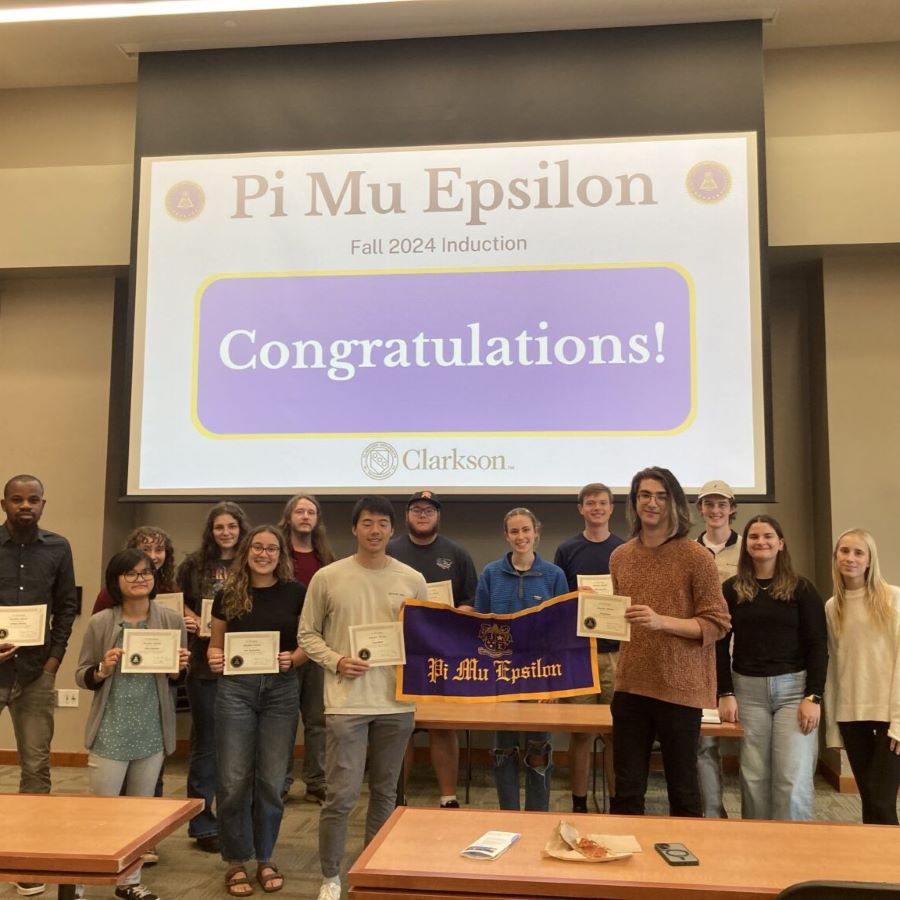 A photo of the PME Students and the newly elected officials of the club at the induction ceremony.