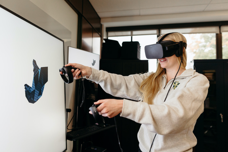 Female student with virtual reality headset.