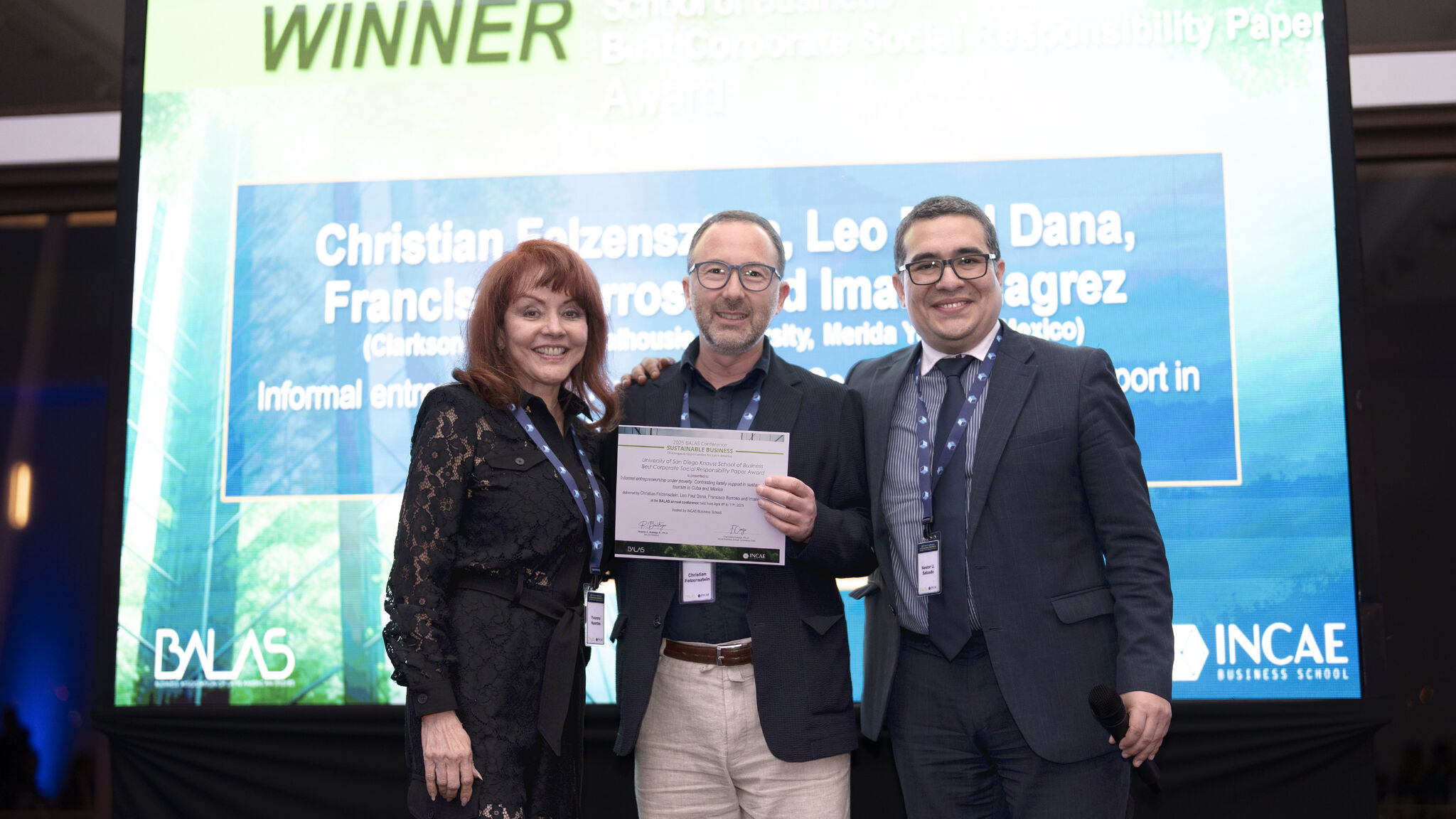 Felzensztein receiving the best paper award on social impact at the Business Association of Latin American Studies hosted by INCAE Business School in Costa Rica.
